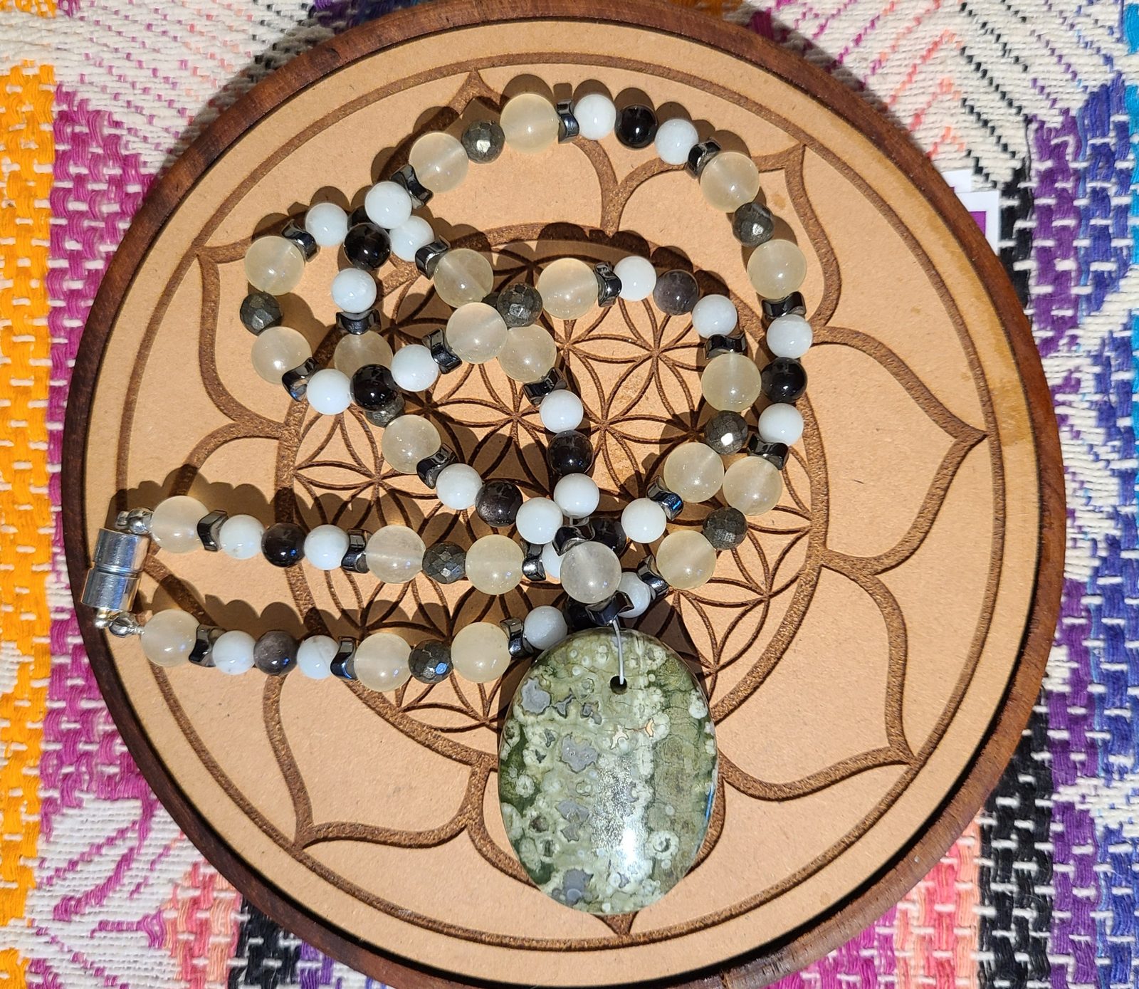 Lilypad-inspired handmade crystal pendant